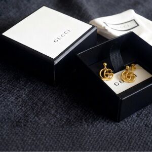 Gucci Gold Tone Double G Drop Stamped Charm Earrings